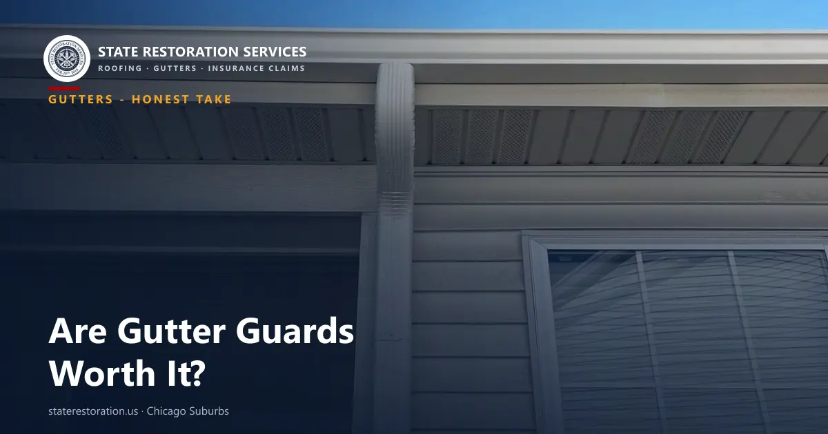 Gutter and downspout on a Chicago-area home roofline, the kind of setup gutter guards protect