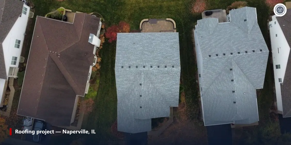 Aerial view of three Chicago-area asphalt shingle roofs on a completed roofing project in Naperville, Illinois