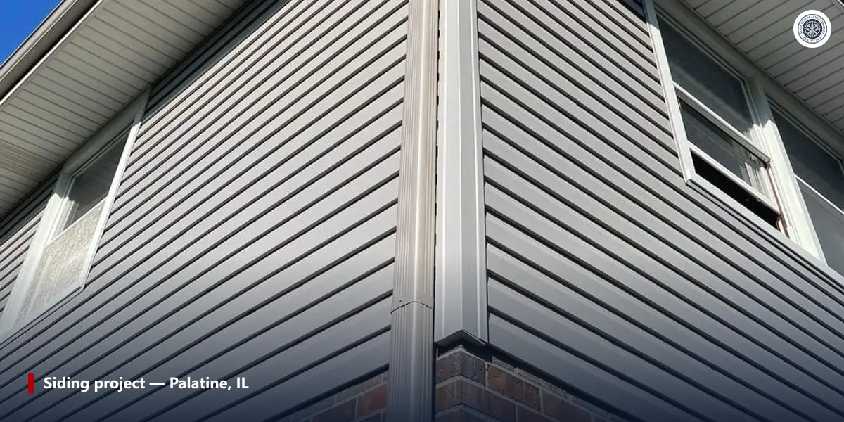 New vinyl double-hung window installed with siding trim on a Chicago-suburb home