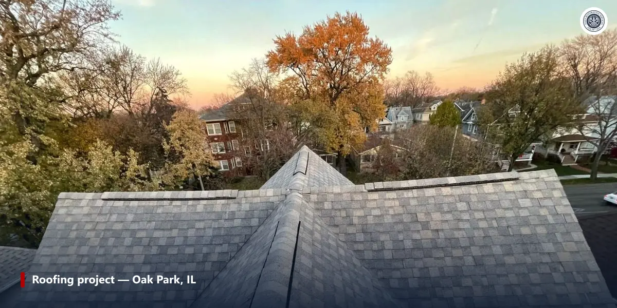 Completed architectural shingle roof photographed from ridge level on a State Restoration Services project in Oak Park, Illinois