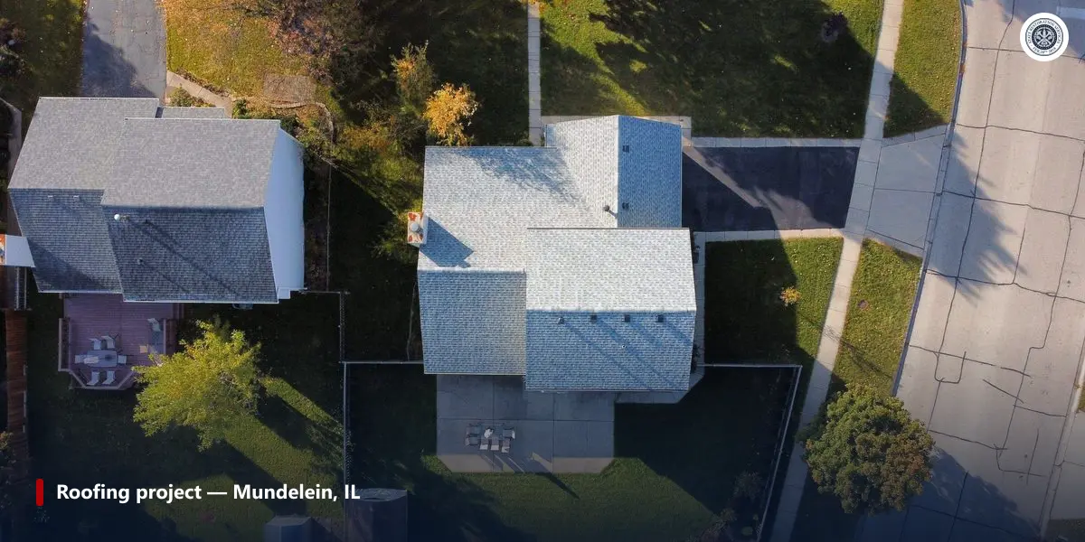 Aerial photo of a completed roofing project in Mundelein, IL, the kind of roof edge detail that helps stop ice dams