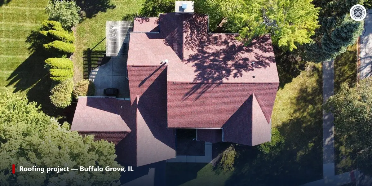 Completed asphalt shingle roofing project on a home in Buffalo Grove, Illinois, seen from above