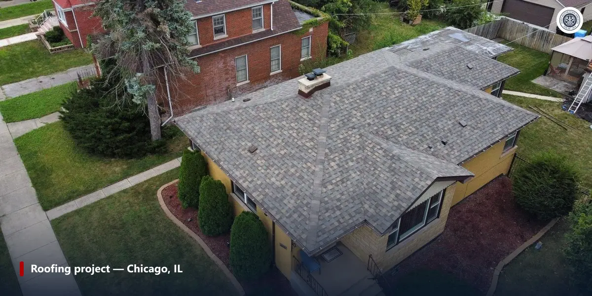 Aerial photo of a finished hip roof with a brick chimney on a single-story house in Chicago, Illinois