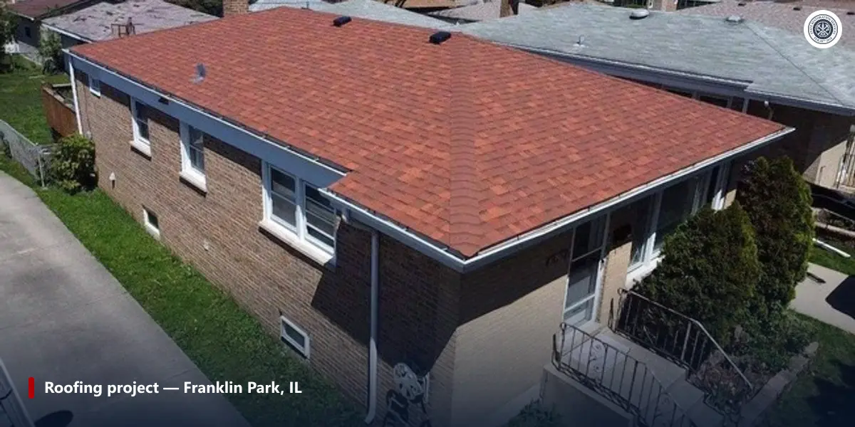 Completed asphalt shingle roof on a brick house in Franklin Park, Illinois, photographed from above