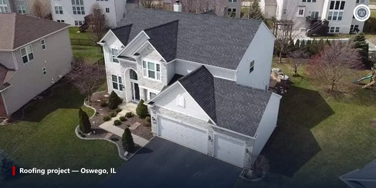 Aerial view of a completed asphalt shingle roofing project on a two-story home in the Chicago suburbs