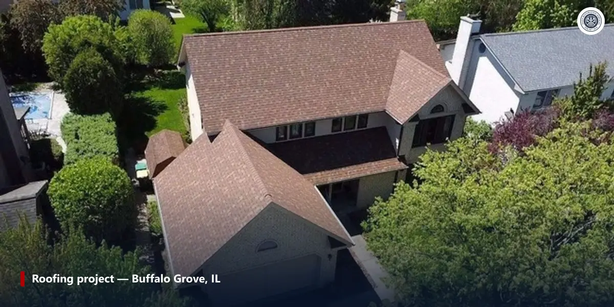 Aerial photo of a completed roofing project in Buffalo Grove, Illinois showing clean fascia and soffit lines along the roof edge