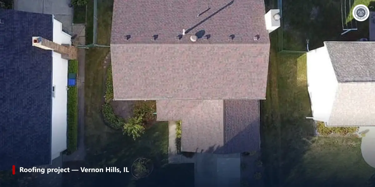 Overhead view of a completed State Restoration Services roof in Vernon Hills, Illinois, showing the eave and rake edges