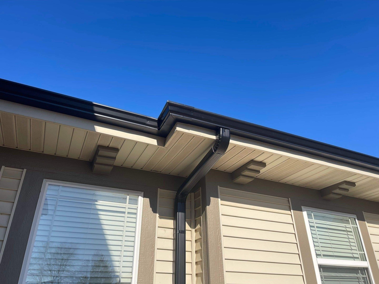 Close-up of the Unusual Black Gutters installed by State Restoration Services, highlighting their distinctive design and precise installation.