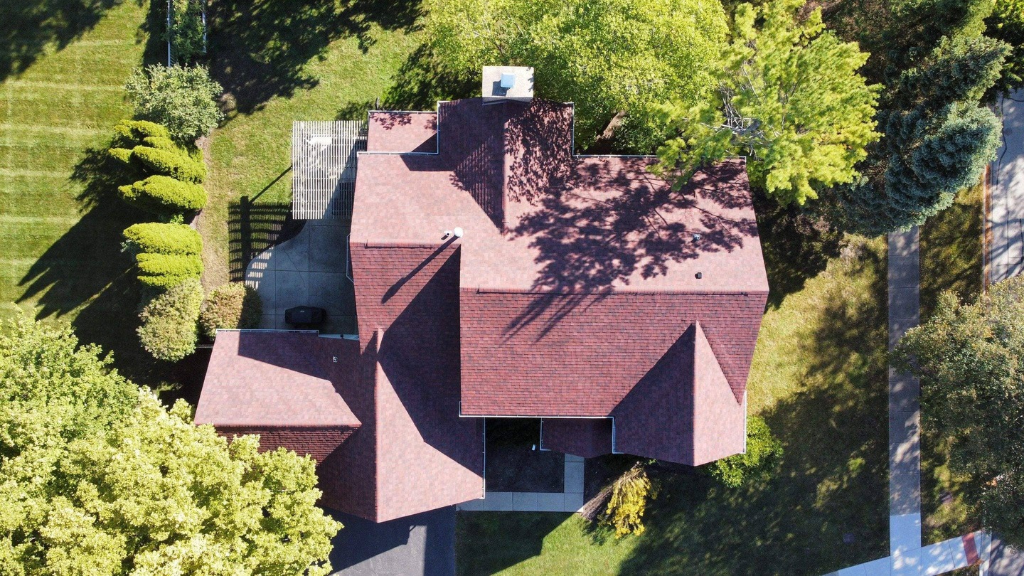 Drone shot of a new roof installation by State Restoration Services, highlighting the precision and quality of their work.