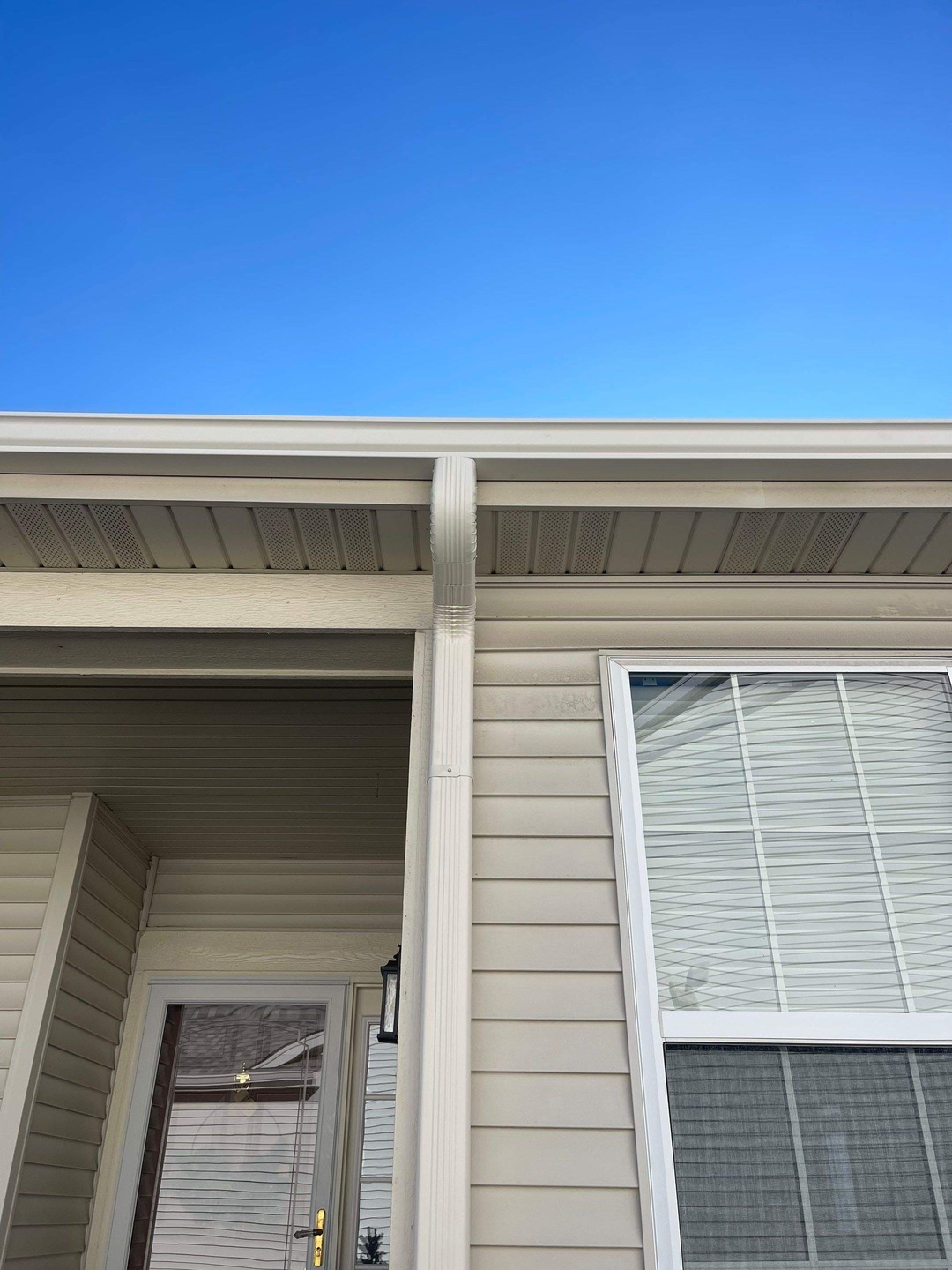 Close-up of newly installed gutters by State Restoration Services, showcasing durable materials and expert craftsmanship.